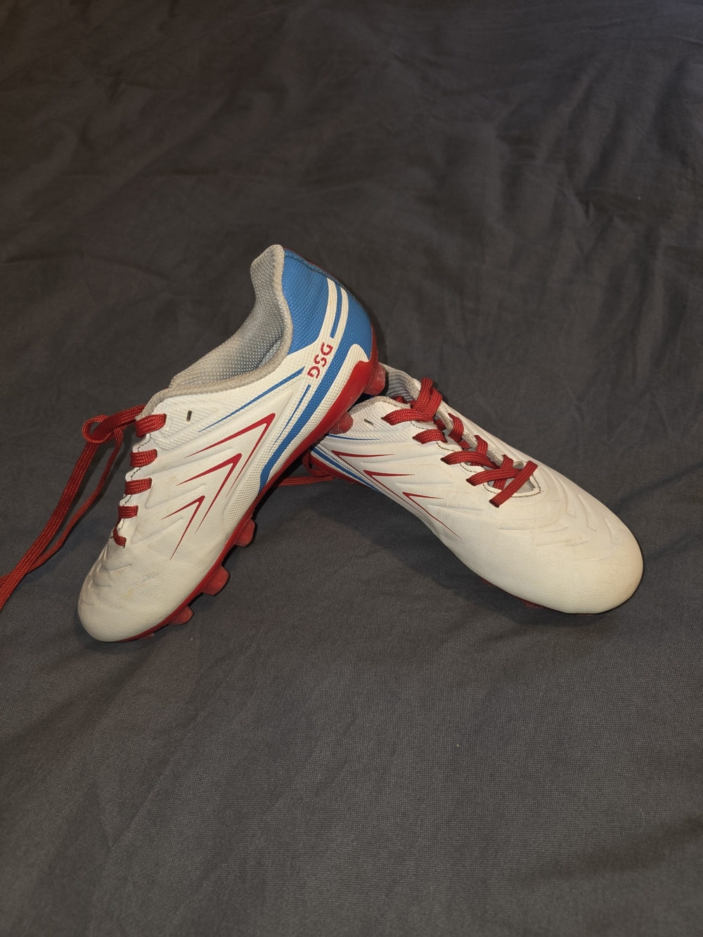 DSG Kids White Soccer Cleats with Red Laces and Blue Heel